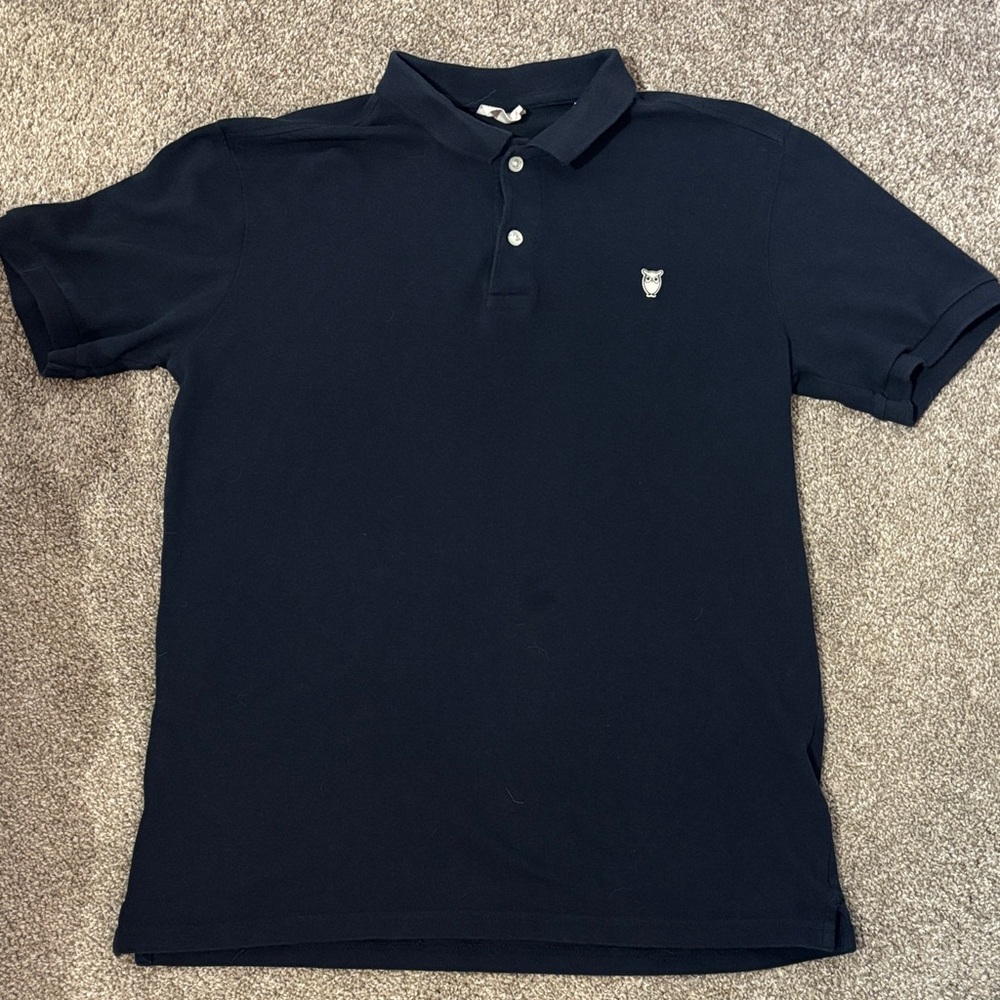 Elegant Navy Polo Shirt with Emblem